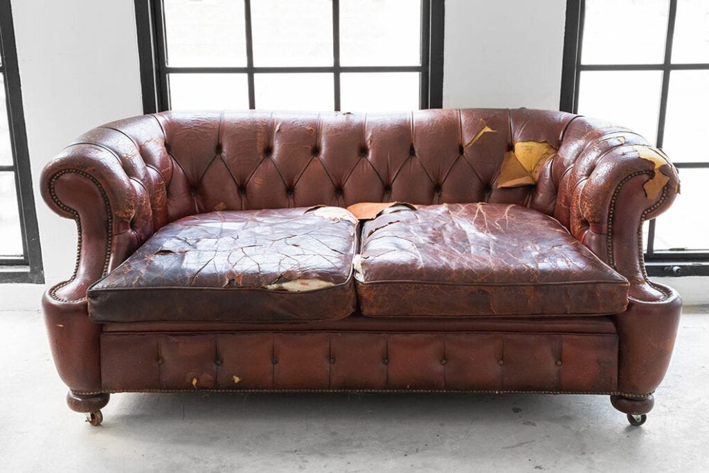 Worn-out couch and sofa removed for responsible disposal in Chicago