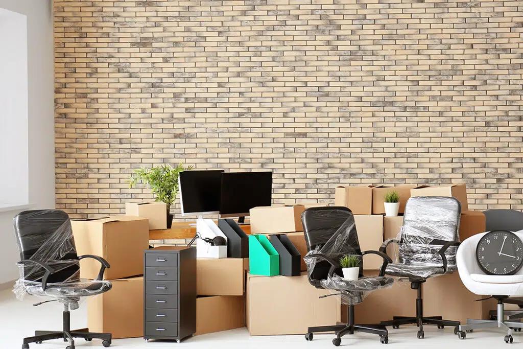 office furniture stacked in one spot, office relocation