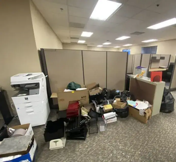 old printer and pile of office junk